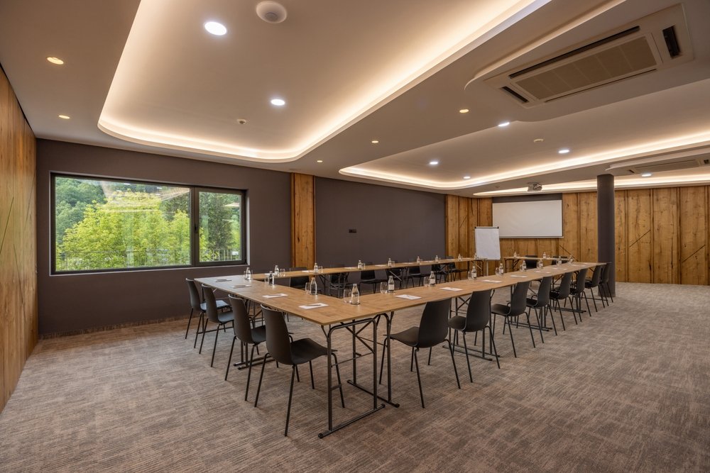 Kamdhenu Equirise — sea-facing living room with panoramic view